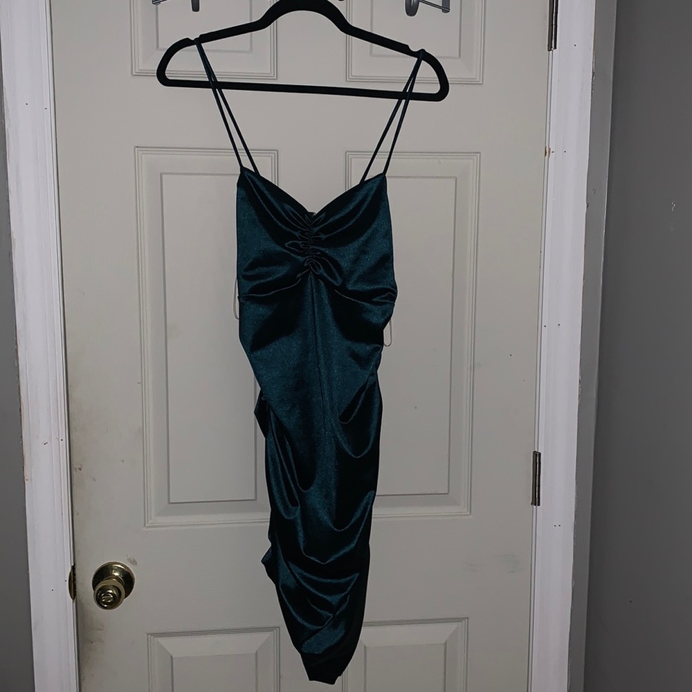 Cute turquoise satin dress.